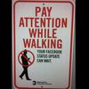 Latest Street Art Etiquette Sign Targets Texting Zombies